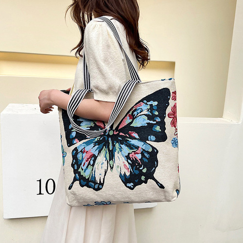 New spring and summer women's bags, new fashion ethnic style canvas bags, large capacity shoulder bags, printed student tutoring bags