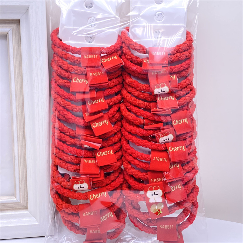 Caqui fresa oso etiqueta de tela anillo de pelo rojo leche té color 03 amor banda de goma lazo de pelo de las mujeres 2 yuanes tienda física