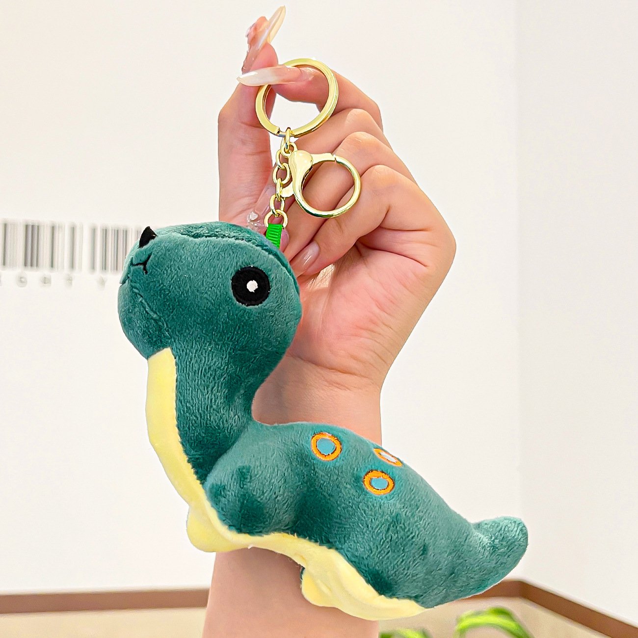 Cuatro pulgadas muñeca máquina colgante felpa llavero lindo muñeca mochila adornos grab máquina muñeca regalo al por mayor