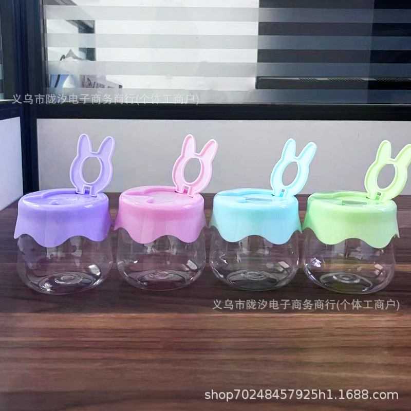 厂家直销可爱卡通食品级糖果包装瓶PET塑料罐透明密封溶豆彩泥罐