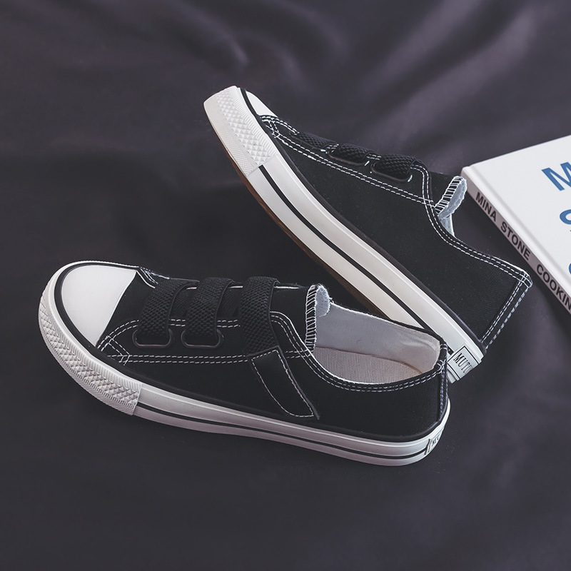 Zapatos de lona bajos de estilo coreano para mujer 2024 Primavera Nueva hebilla zapatos blancos mocasines para estudiantes zapatos de goma vulcanizada zapatos de tela