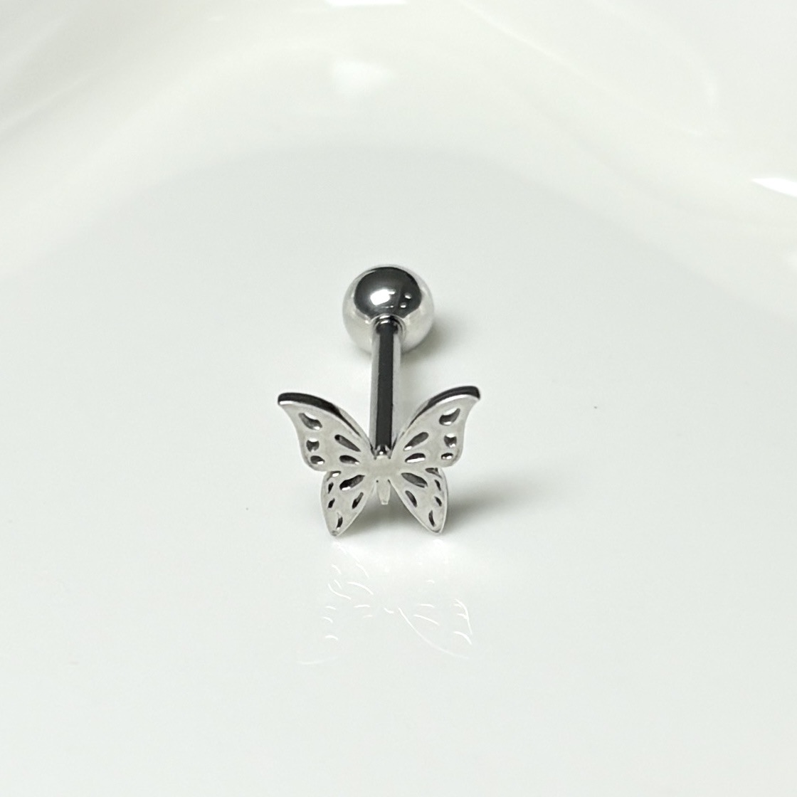 Pointed labret stud close-up product detail