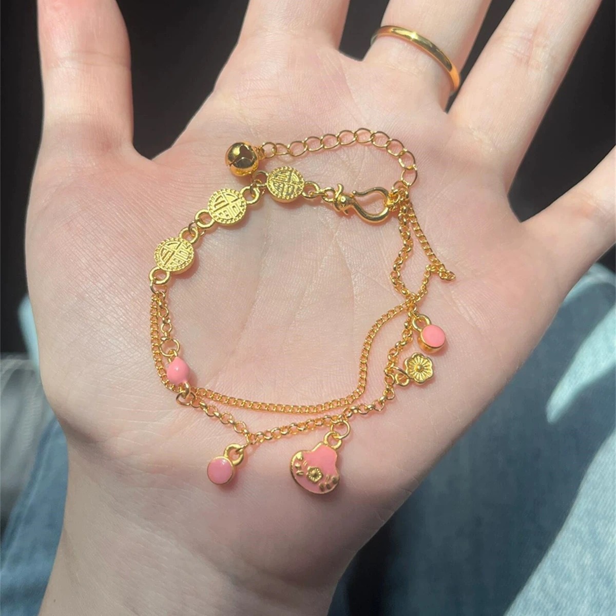 Shajin pink silver ingot bell lucky brand bracelet does not fade for a long time sweet fresh temperament high sense does not fade for a long time_voghion.com