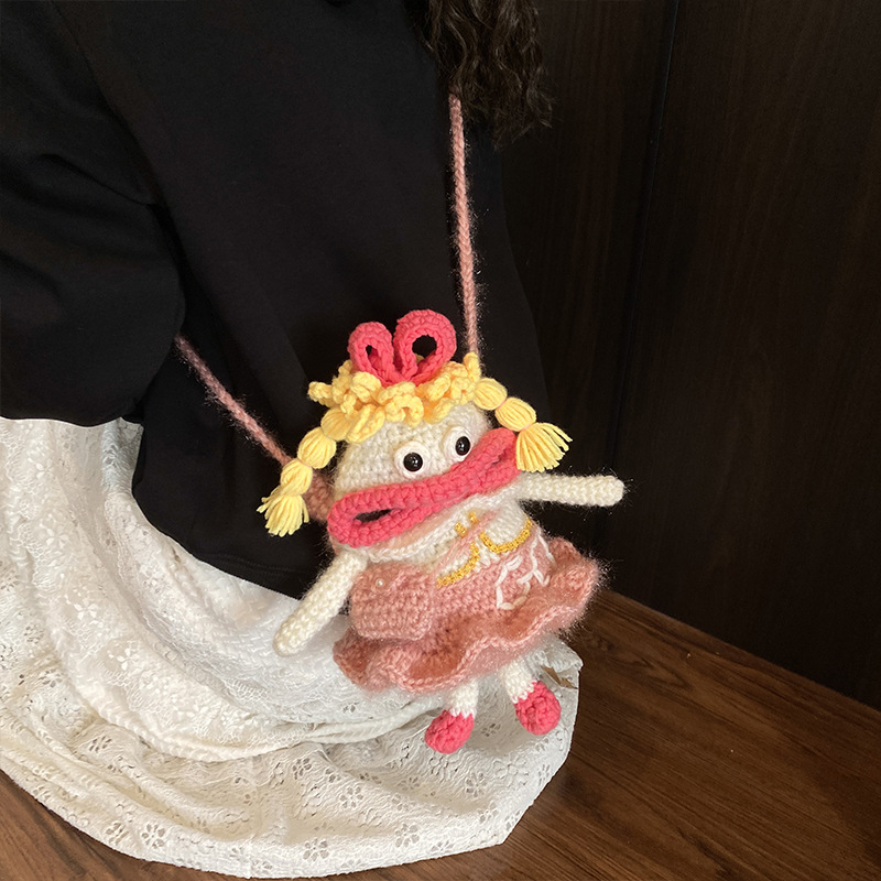 Otoño y invierno nuevo gancho de lana bolsas de niños divertidas extrañas bolsas de accesorios para bebés caricaturas bolsas de cambio para niños y niñas