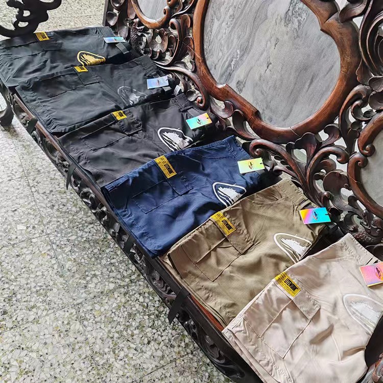 Retro americano de alta calle de bolsillo crucero impresión de herramientas pantalones cortos hombres marca de moda de verano pantalones cortos de herramientas sueltos hombres