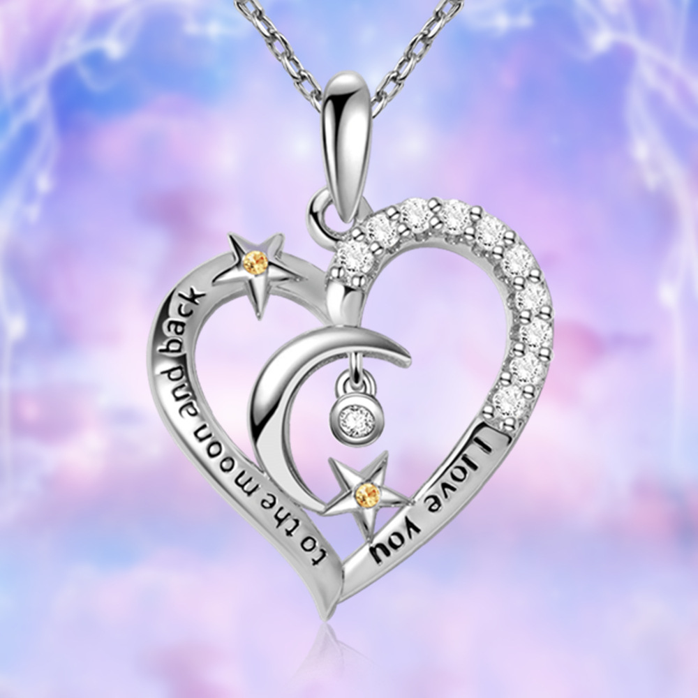 Collana con pendente a forma di cuore stella e luna gioielli donna_voghion.com