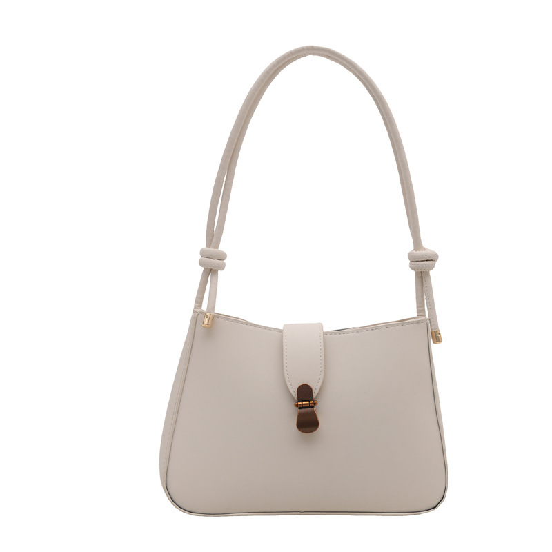 Bolsa de brazo retro para mujeres 2025 primavera nueva bolsa de moda pequeña bolsa de viaje coreana simple bolsa de hombro extranjera