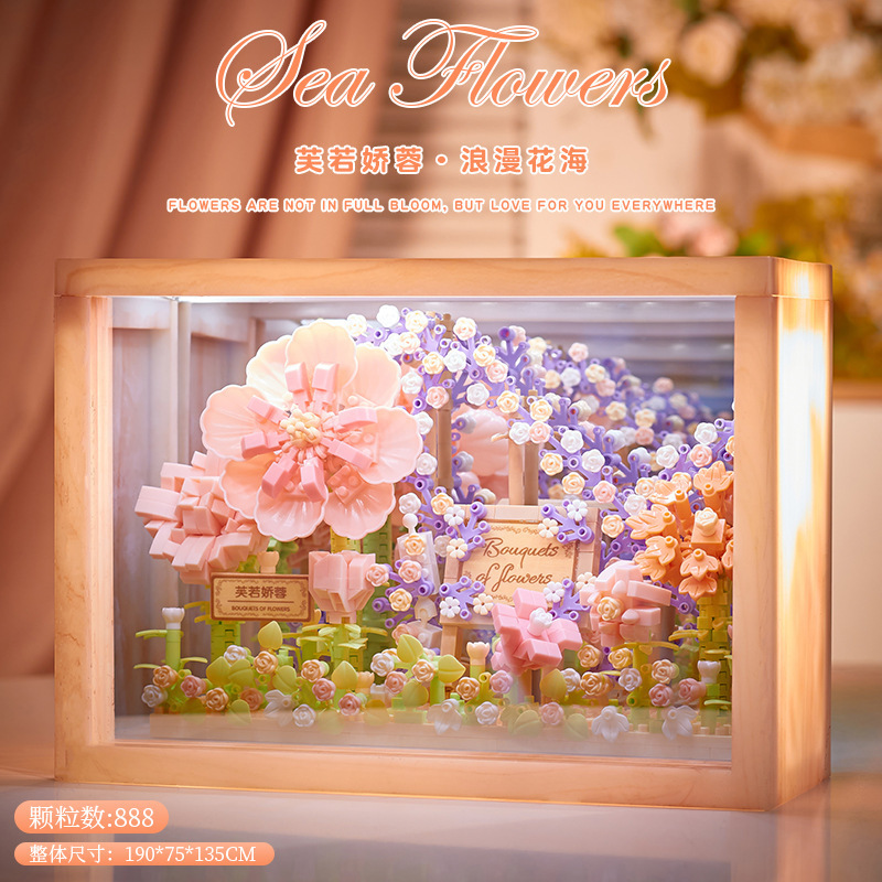 積み木の花がバラのオルゴールを飾っています。|undefined