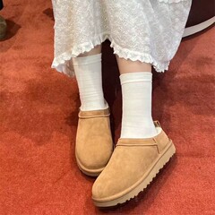 冬季新款女靴短筒斜坡口雪地靴女牛皮加绒保暖鞋防滑