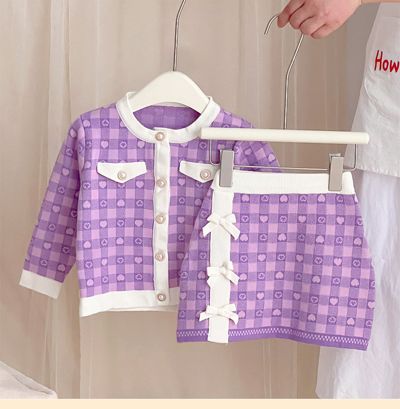 JINYONG Koreansk utgåva Love Knitwear Flickkjol med rosett och omlott, liten och medelstor, barnmodell, tvådelat set_voghion.com
