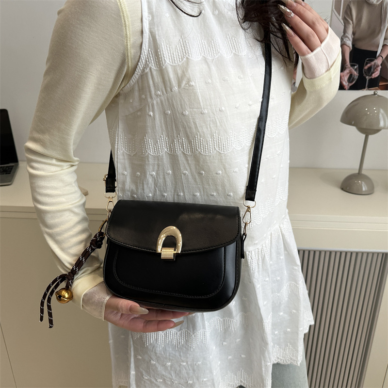 A principios de la primavera de 2025, bolsos de silla de moda casuales coreanos, bolsos de mujer de alta calidad.