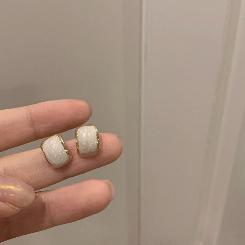 Aguja de plata flor pendientes geométricos pendientes dulces pequeños frescos de Corea del Sur ins moda nicho pendientes