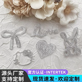 布贴;烫图、烫钻;洗唛、商标