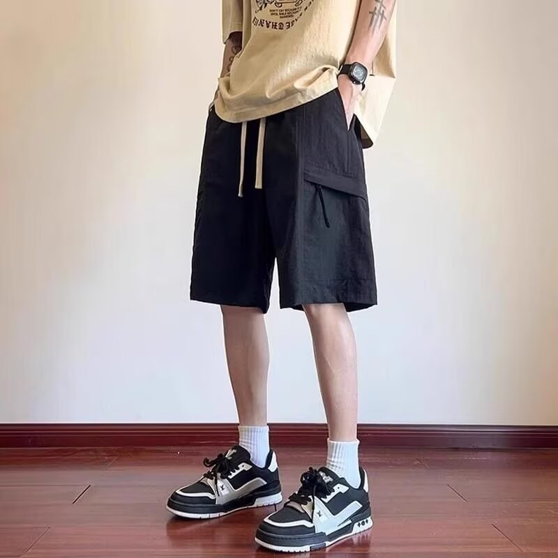 Camisas menos ropa, nuevos productos de verano, monos casuales para hombres, pantalones cortos ins de tendencia recta, pantalones transpirables sueltos de todo fósforo