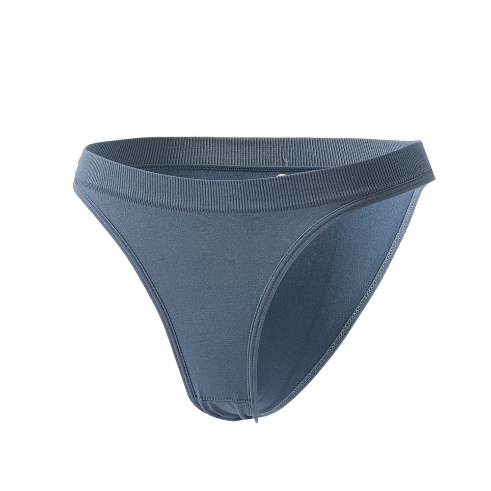 Mujeres europeas y americanas sin costuras de color sólido cómodo bajo la cintura de la cabeza de la ropa interior Tanga deportiva más el tamaño sin costuras sexy elástico T-string