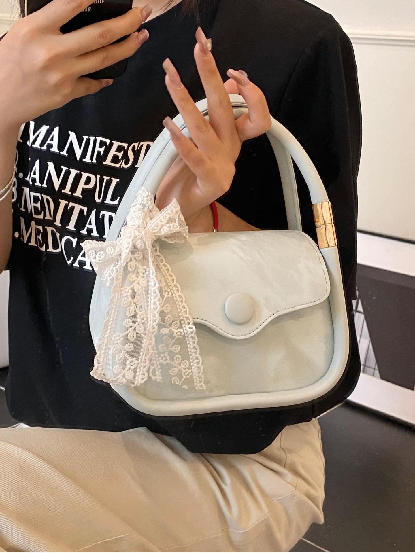 Bolso cuadrado pequeño de mano de estilo occidental de moda para mujer 2025 nuevo bolso de hombro casual de todo fósforo bolso de mensajero de alta calidad transfronterizo