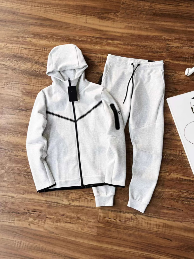 新しいメンズ春と秋のジャケットとズボンのフード付きスポーツカジュアルオールマッチスーツステッチフード付きジッパーウインドウォーカーシリーズ