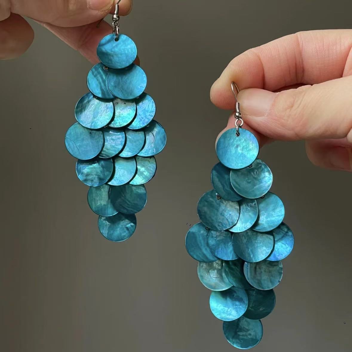 Pendientes de borla de concha geométrica redonda, estilo de vacaciones junto al mar, gancho para la oreja, pendientes de todo fósforo de moda, sentido de clase alta de nicho