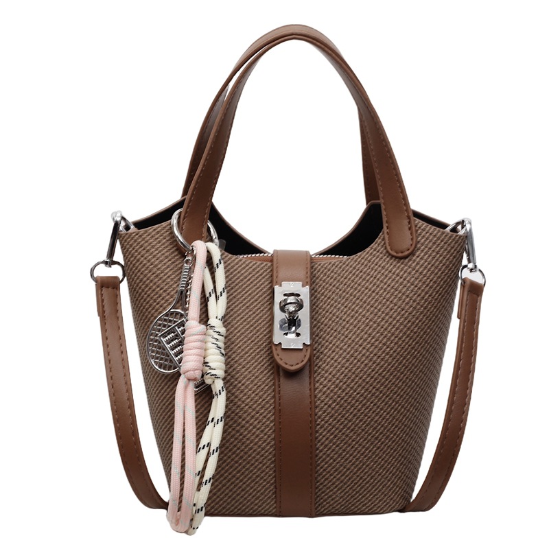 Bolso de cubo de estilo explosivo de mano de comercio exterior para mujer 2025 nuevo bolso de hombro casual de todo fósforo bolso de mensajero de estilo coreano