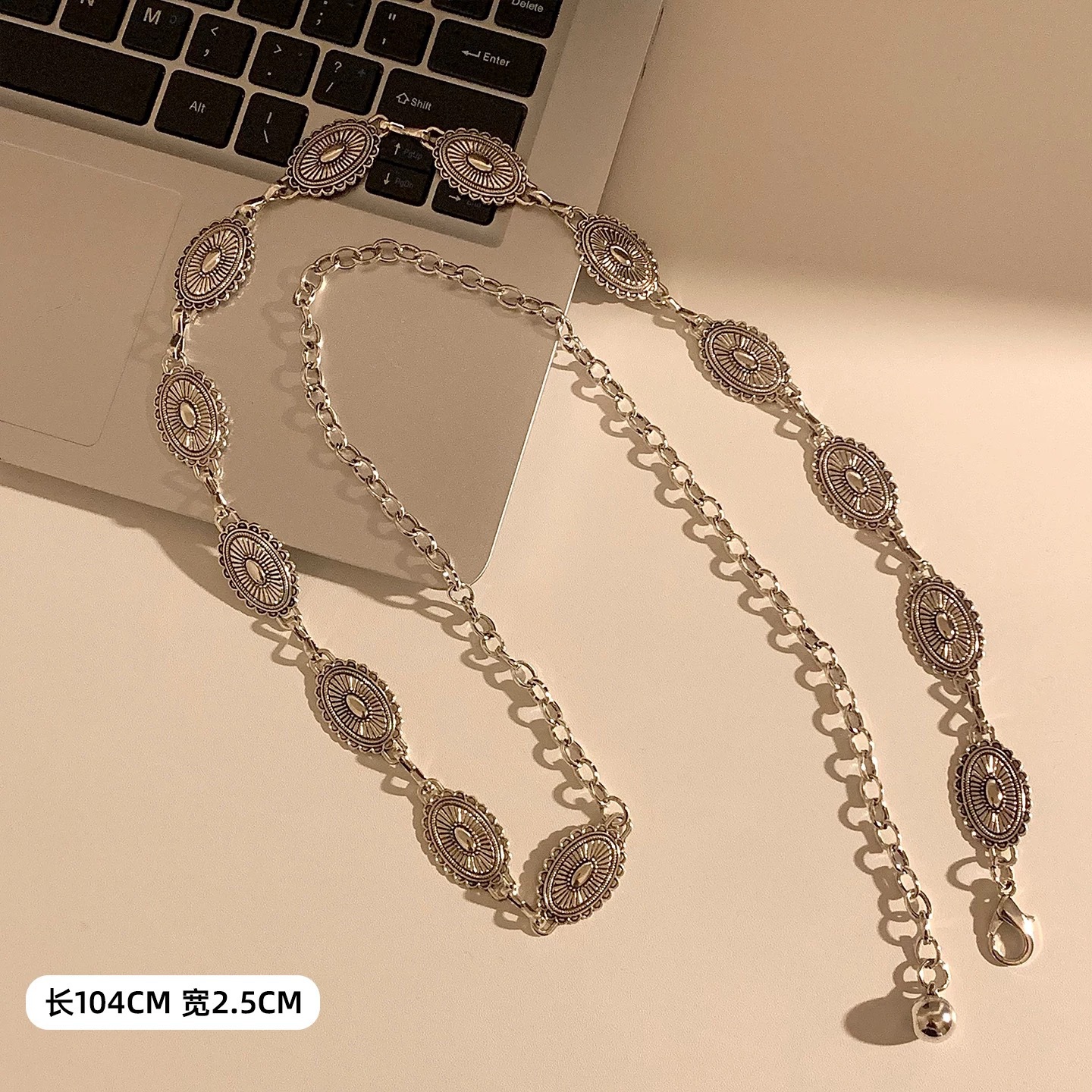 19 # The total length of the antique silver metal chain with daisy carvings is about 112cm
