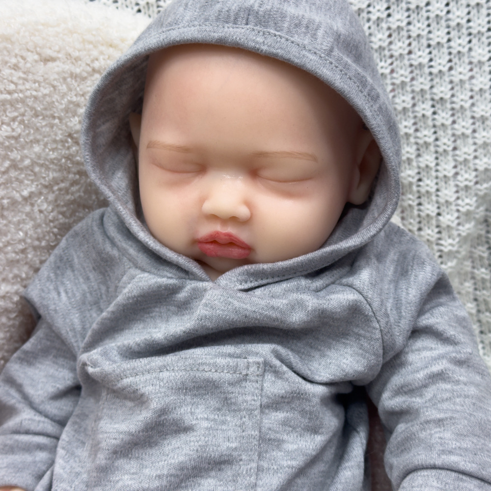 Muñeca de regeneración muñeca simulación muñeca bebé recién nacido lindo sólido 45cm pesado silicona suave estiramiento