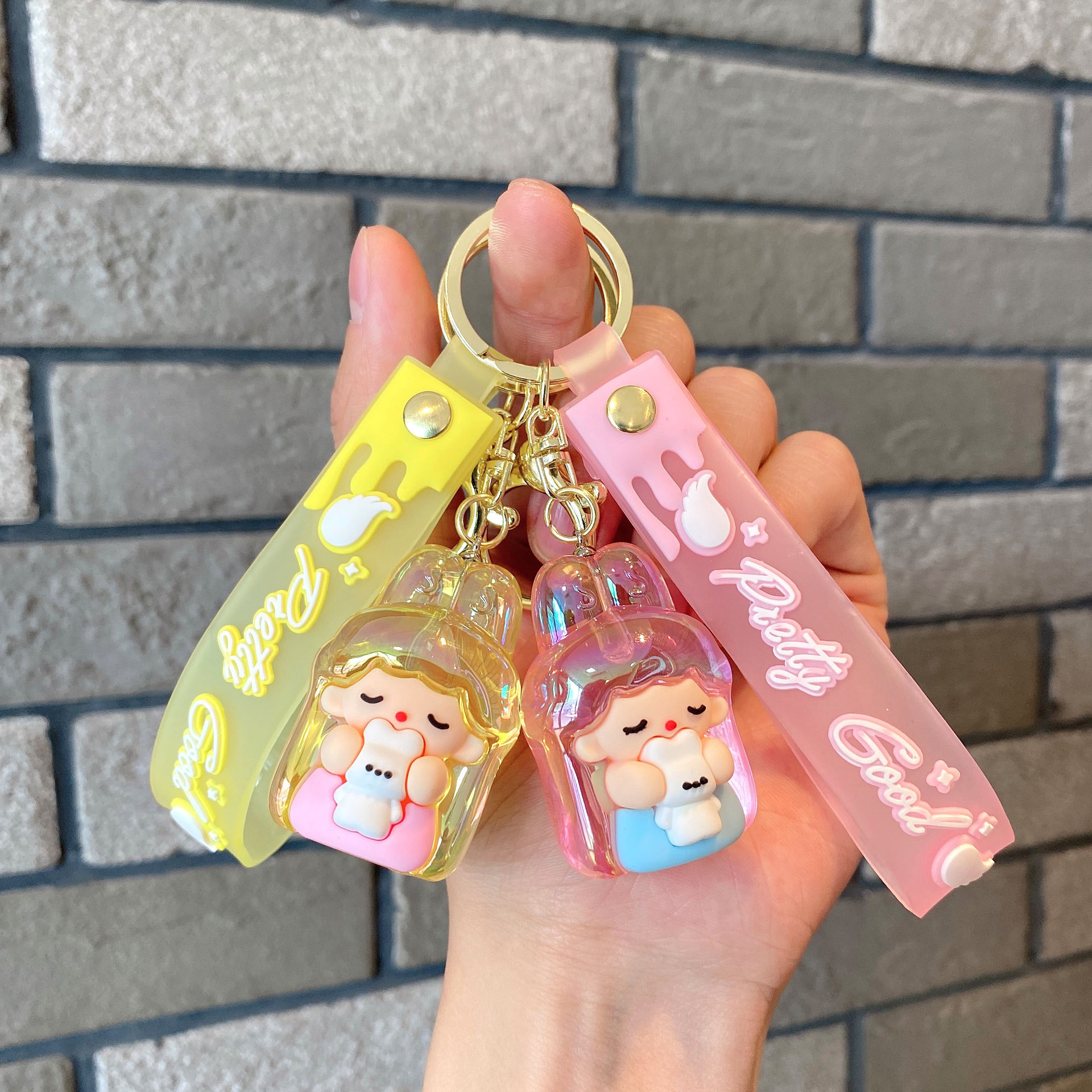 Acrílico transparente UV colorido dibujos animados lindos orejas de conejo llavero colgante pareja pequeña bolsa de regalo accesorios