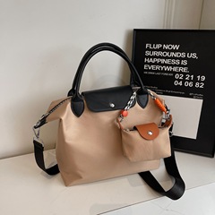 2025春の大容量はギョーザを手にして潮を越えた龍bagsの首を上げて子母をつないで小衆の肩を包んで斜めに包んだ