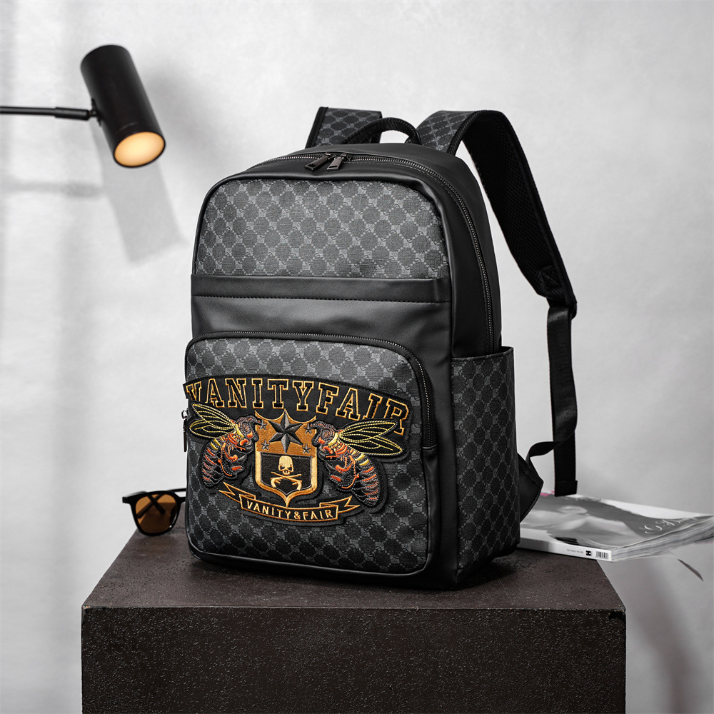 Sac à dos pour ordinateur portable pour homme avec broderie originale - Sac de travail antivol de grande capacité et résistant à l'eau, sac d'ordinateur durable de 15 pouces, style de voyage unisexe 2025_voghion.com