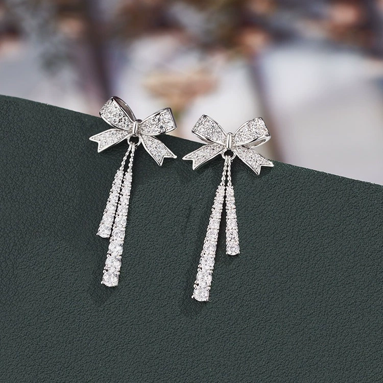 Bow dangle earrings, silver needle posts, light luxury crystal pendant, elegant bow design