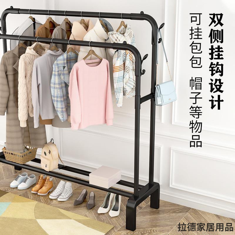 piso percha de ropa dormitorio plegable grueso grueso pequeño interior de plástico percha de ropa doméstica doble varilla balcón