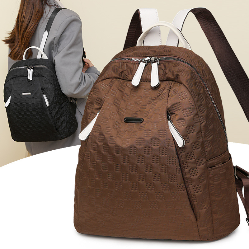 2024 otoño nuevo estilo casual todo fósforo damas mochila de nailon moda color de contraste ligero mochila de viaje de viaje