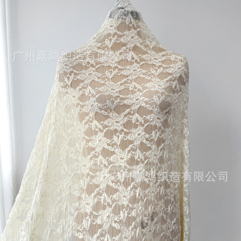 Tejido de encaje de burbuja plegado tela de encaje tridimensional base de encaje elástico fabricantes de ropa de mujer en stock
