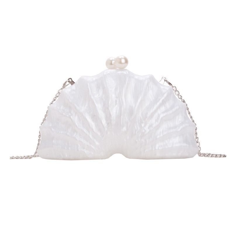 Europa y los Estados Unidos nuevos paquetes de cena de damas de hombro único en forma de concha acrílica de mano de lujo ligero paquete de moda de noche