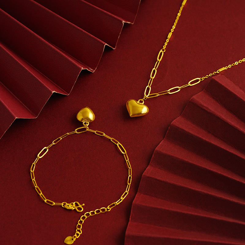 Simple 3D hueco en forma de corazón traje en forma de corazón pulsera elegante collar de las mujeres con aleación de cobre de moda del todo fósforo