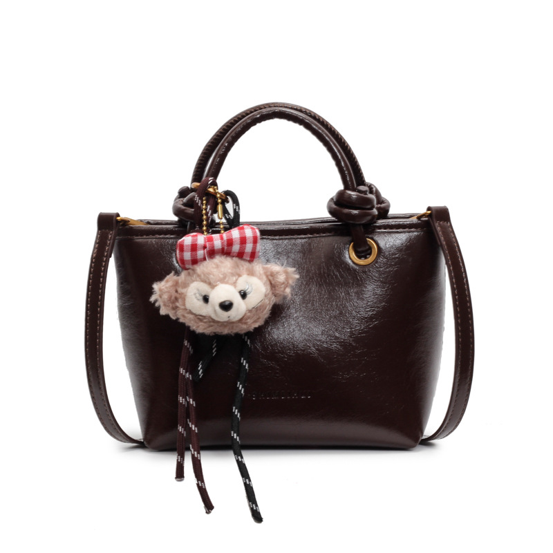 Otoño y invierno Meirad bolsos de mujer 2024 nueva moda moda bolsos de cubo de mano alta sensación de mochila versátil