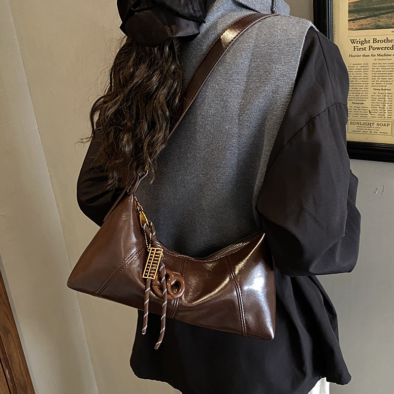 Bolso de brazo de nicho coreano, bolso de palo de mujer 2025, otoño y invierno, nueva moda, bolso de hombro de viaje al trabajo