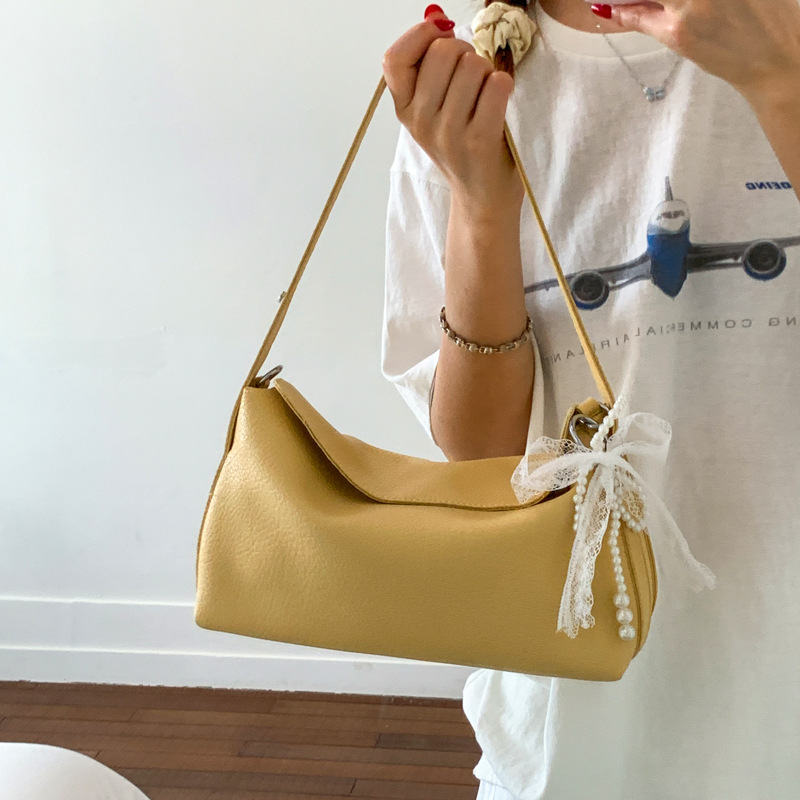 Bolsa de hombro portátil de gran capacidad para mujeres 2026 sensación cotidiana de lichi estampado bolso de almohada coreano bolso de brazo