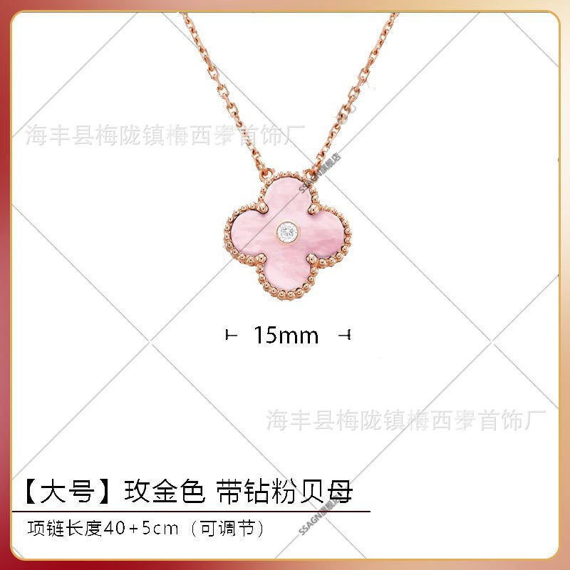 Large four-leaf clover necklace in rose gold and pink mother-of-pearl with diamonds in the middle