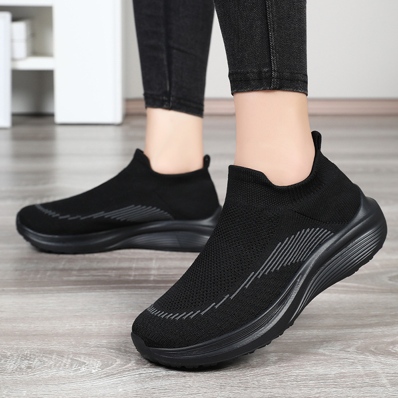 Zapatos mujer todo fósforo primavera nuevo estilo volador tejido transpirable zapatos casuales calcetines de un pie zapatos de madre de suela blanda al por mayor