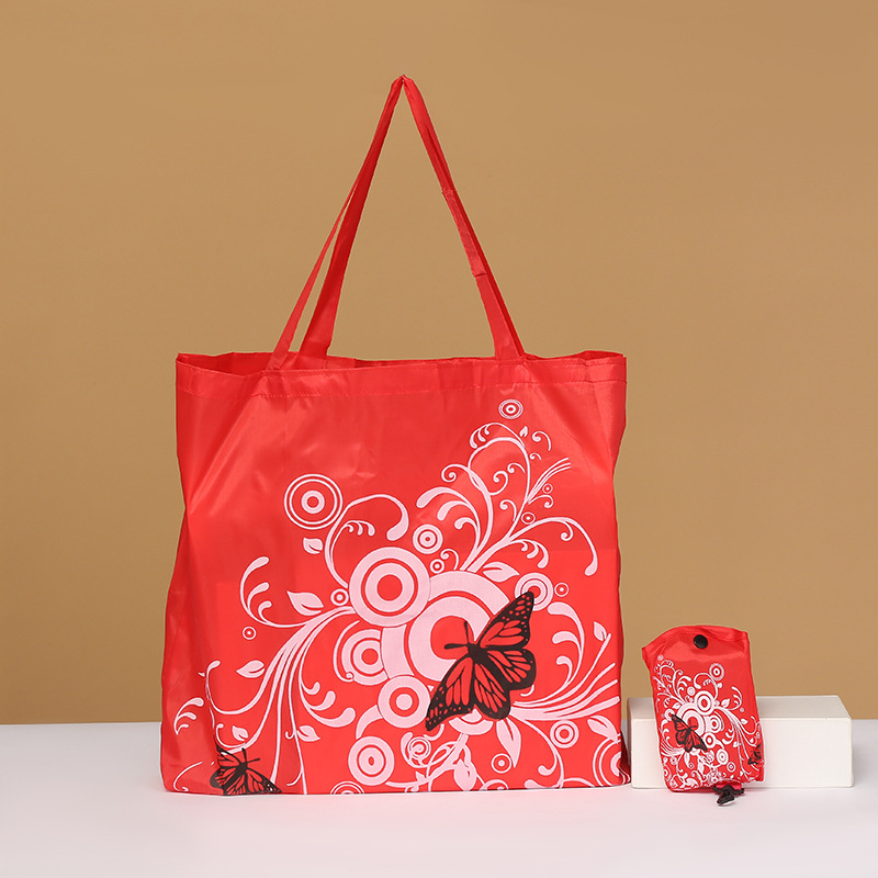 Bolsa de compras plegable de flores de mariposa Portátil Bolsa de protección ambiental en stock logotipo imprimible bolsa de almacenamiento de tela de poliéster Oxford