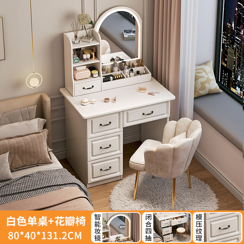 Luz y lujo de alta sensación de la mesa de maquillaje de la pequeña casa en una mesa dormitorio moderno simple con espejo mesa de maquillaje