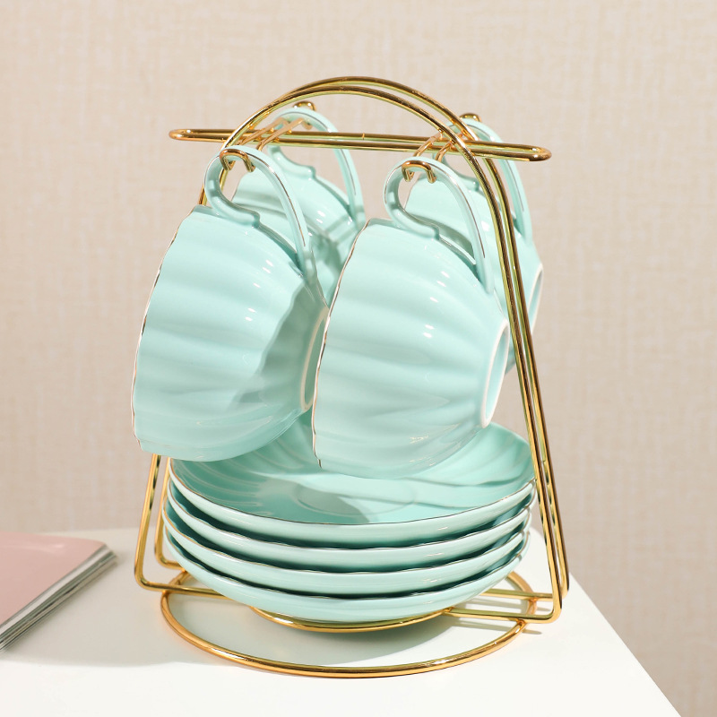 Comercio exterior de cerámica taza de café platillo juego de té regalo simple flor taza de té hogar taza de agua café traje de regalo con estante