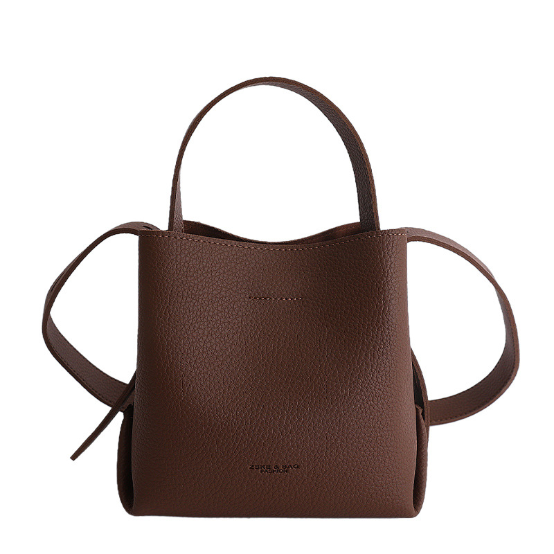 Bolsa de cubo de mano coreana 2026 nuevo nicho diario bolso de cubo bolso de mujer gran capacidad de transporte de viaje mochila
