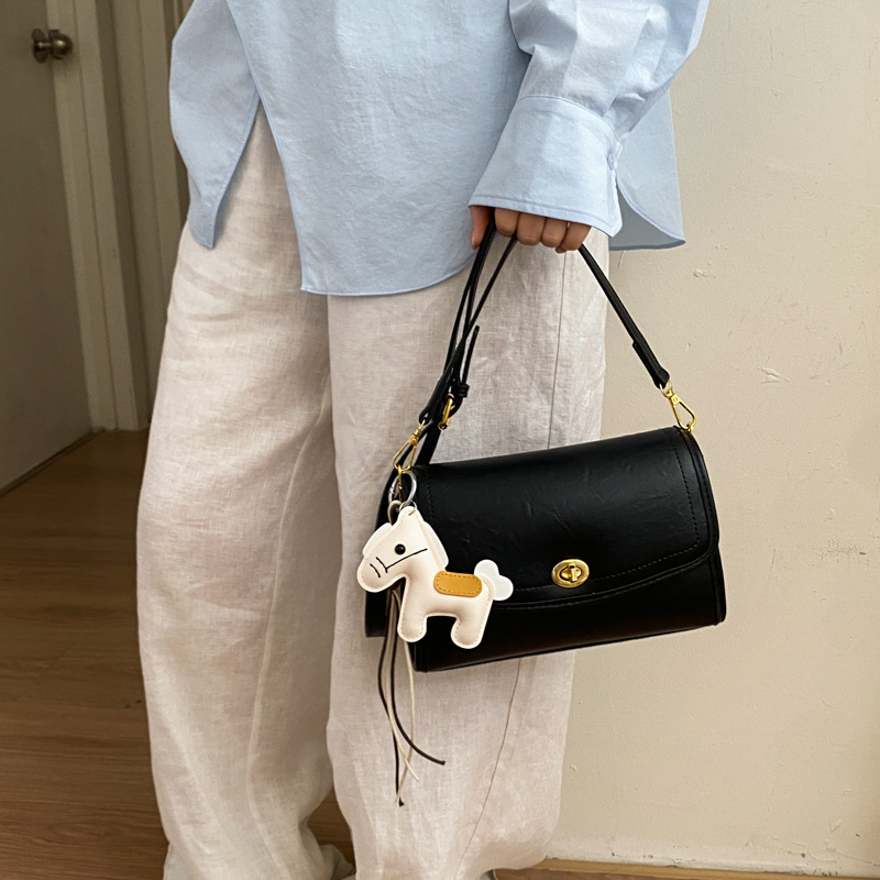 Nicho de diseño sensación de bolso cuadrado pequeño para mujeres 2026 nuevo super caliente bolso de hombro de brazo sensación diaria bolsa de mochila versátil