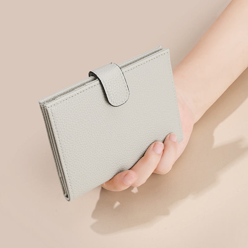 Cross-border damas antirrobo cepillo RFID pasaporte bolsas multifuncionales billete de avión funda de certificados PU cartera general