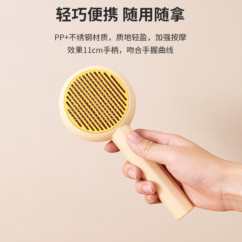 Cross-border nuevo peine mascota gato de acero inoxidable aguja peine masaje cepillo de eliminación de pelo de un solo clic de eliminación de pelo de perro peine de eliminación de pelo