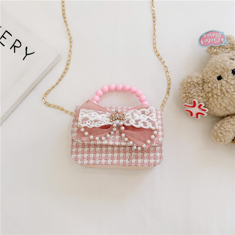 2024 nueva moda lindas bolsas de hombro para niños bolsas de perlas a cuadrícula bolsas extranjeras bolsas de hombro para niñas gran capacidad marea