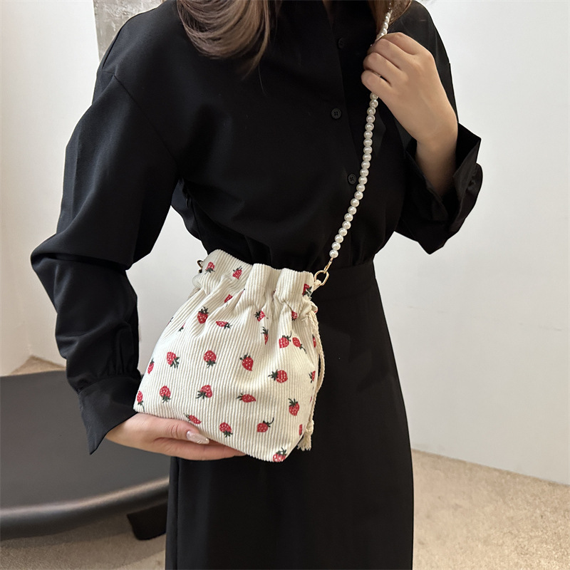 Dulce y lindo bolso de cubo de este año, popular cinturón de cuentas de velcro, exquisito estilo extranjero, bolso de hombro de mujer.