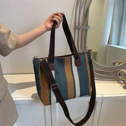 Trendy large-capacity striped canvas bag for women  new fashion commuter handheld tote bag single shoulder crossbody bag