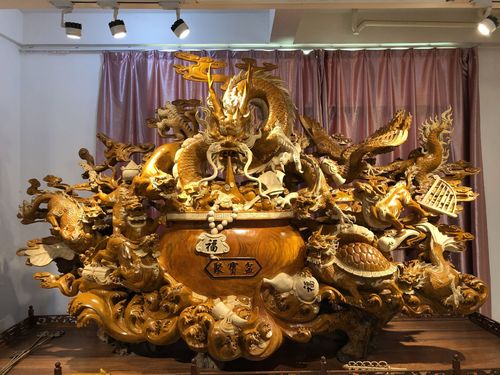 Thuja cypress, bouldering flower, ebony carving, landscape, gold wire, nan root carving, ebony ornaments, living room, Zen Buddha statue carving crafts